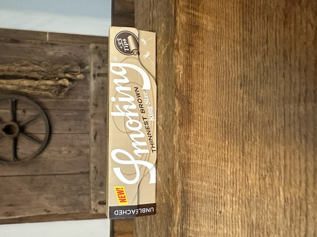 Photograph of product: Smoking Unbleached Thinnest King Size Papers with TIPS
