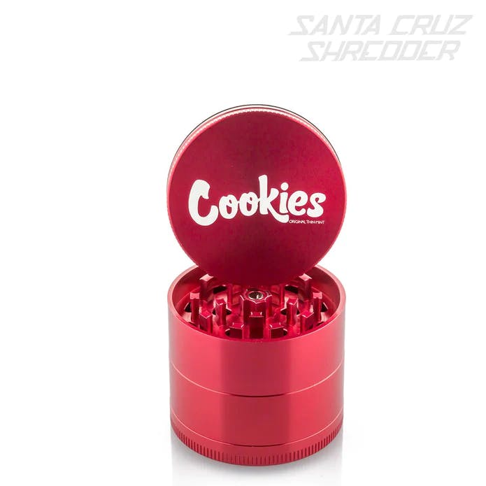 Photograph of product: COOKIES 4 PIECE MEDIUM ALUMINUM GRINDER - RED