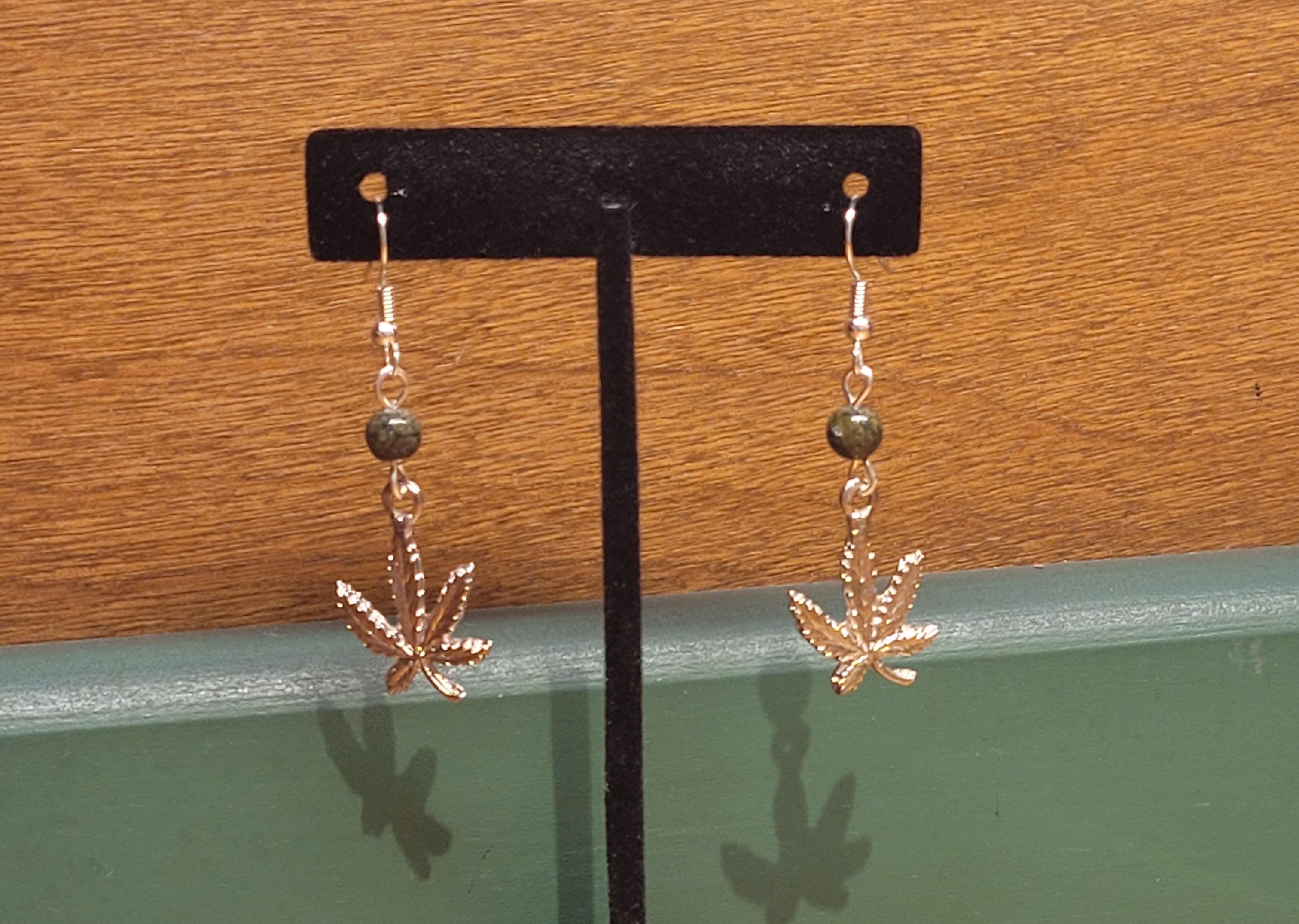 Photograph of product: Larynx Jewels | Pot Leaf Earrings