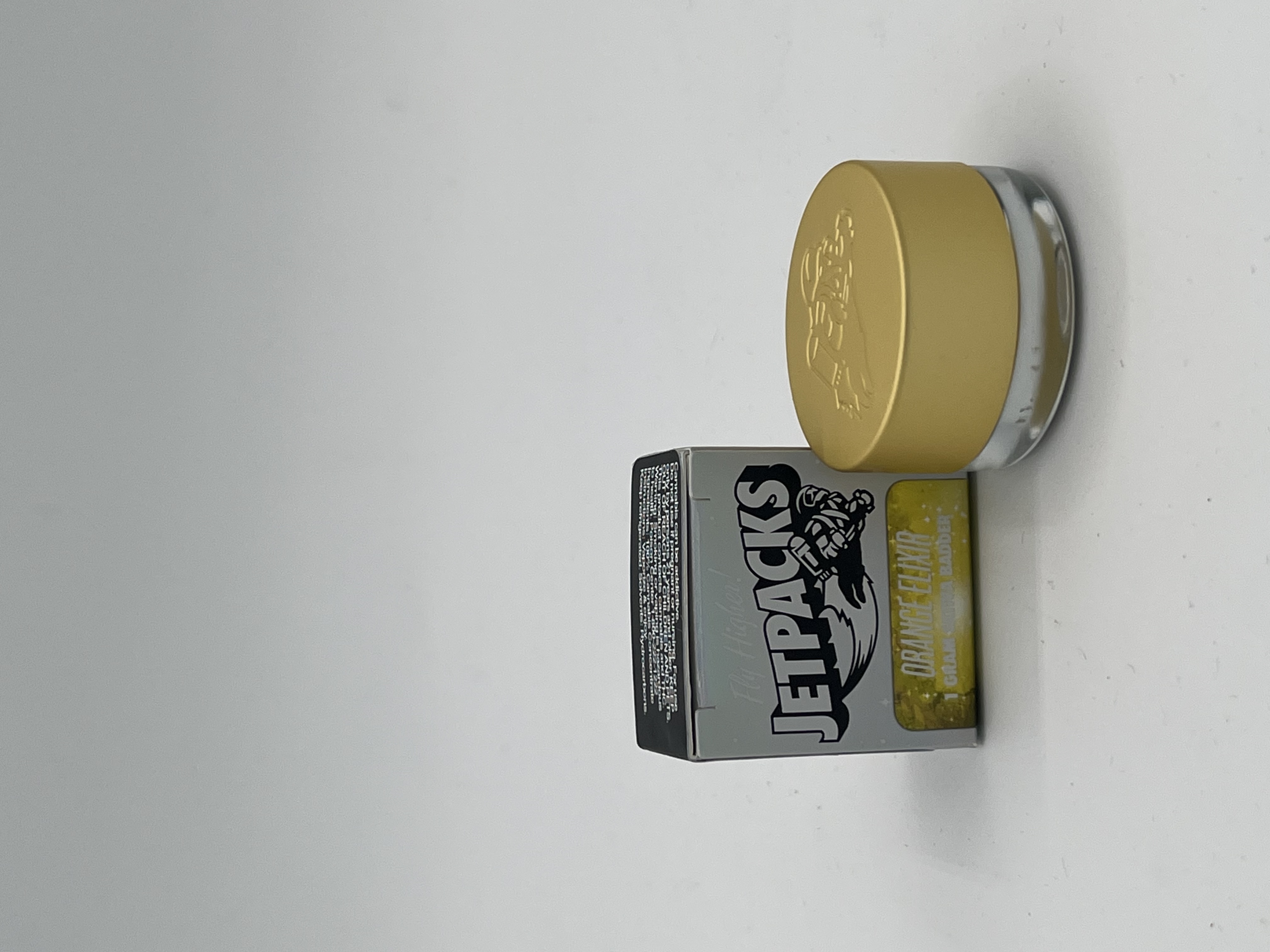 Photograph of product: Jetpacks | Orange Elixir | Badder Concentrate | 1g