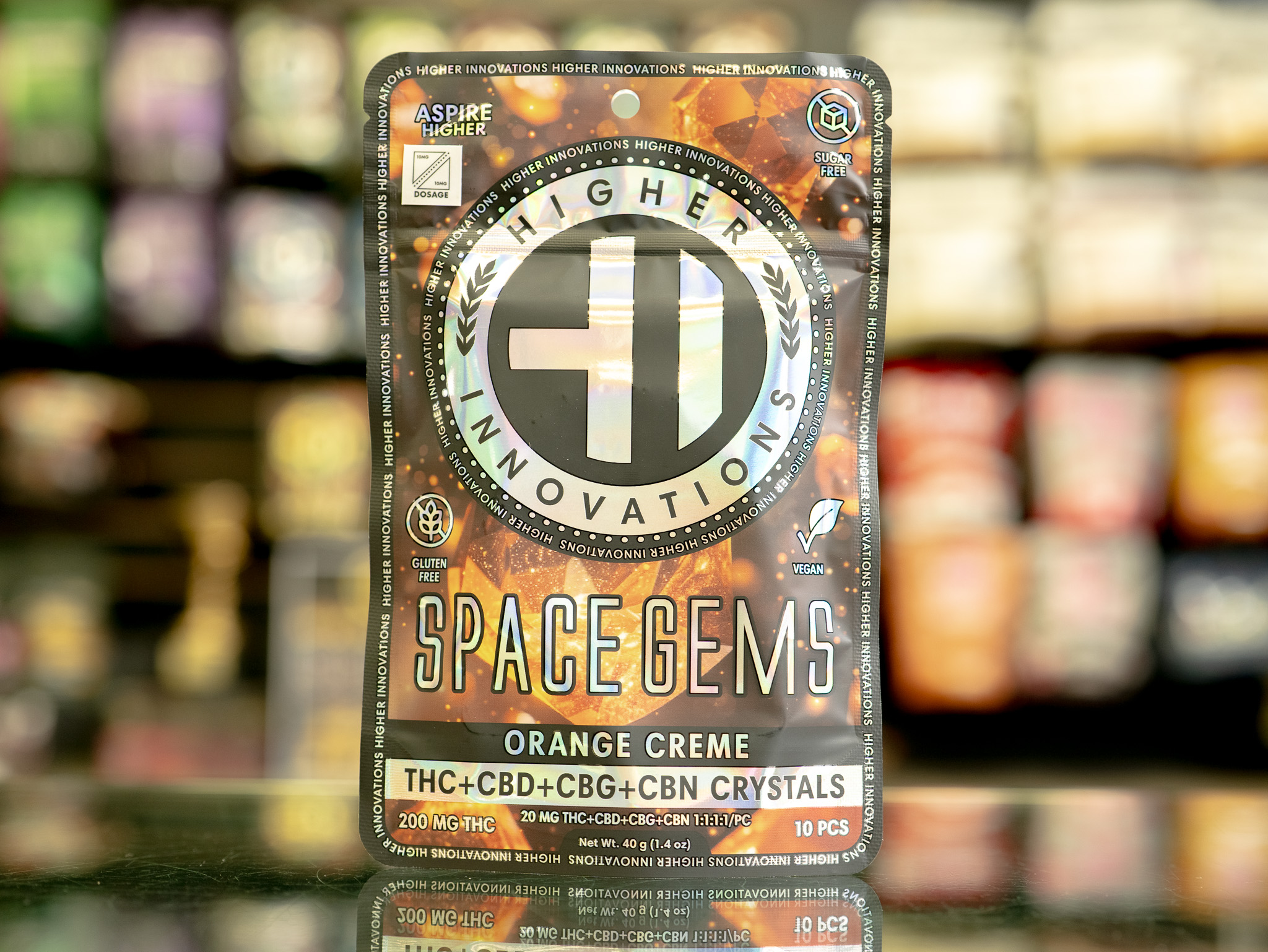 Photograph of product: Higher Innovations | Orange Creme Space Gems | 1:1:1:1/PC TH-oui:CBD:CBG:CBN 10pc Hard Candy
