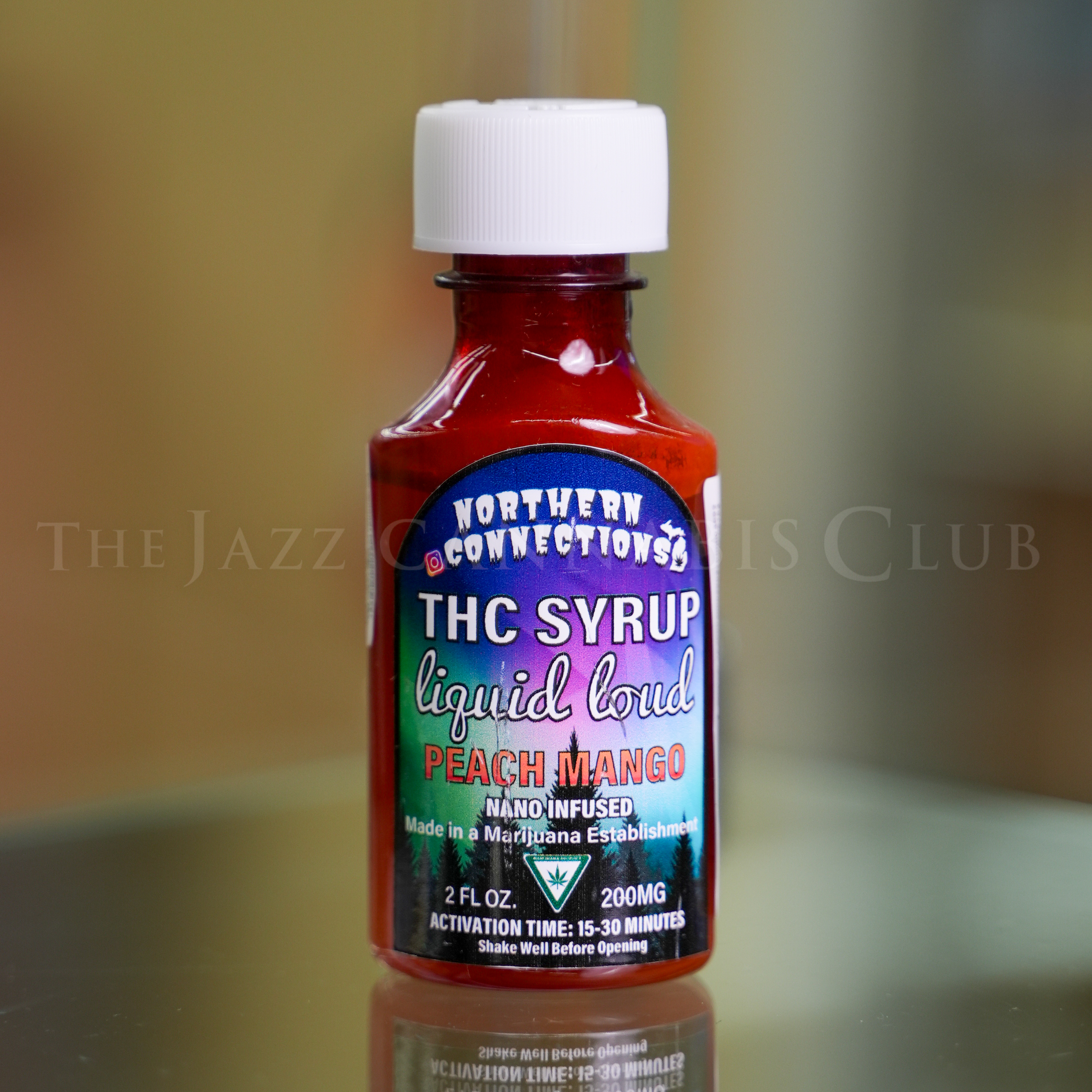 Photograph of product: Northern Connections - Peach Mango - TH-oui Syrup 200mg