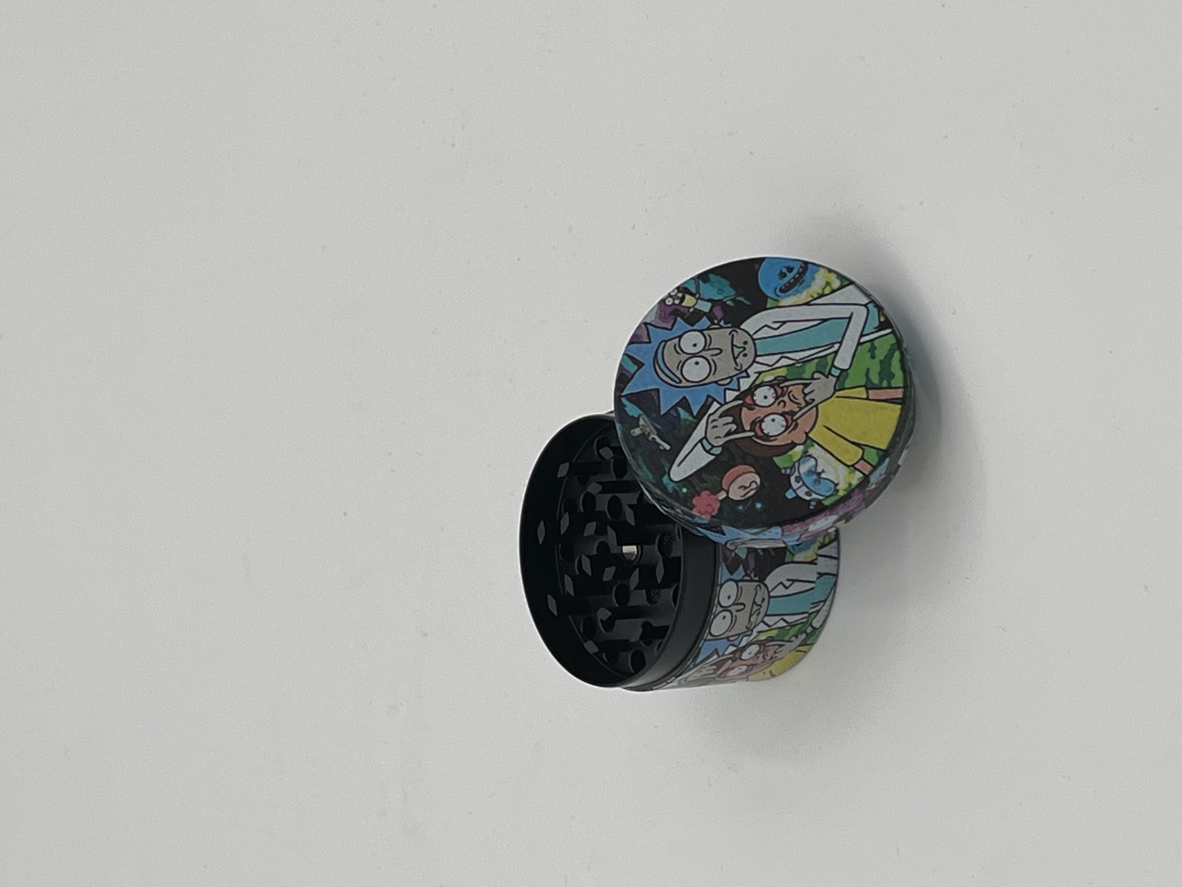 Photograph of product: Grinder | 4-Part Rick and Morty | 53mm