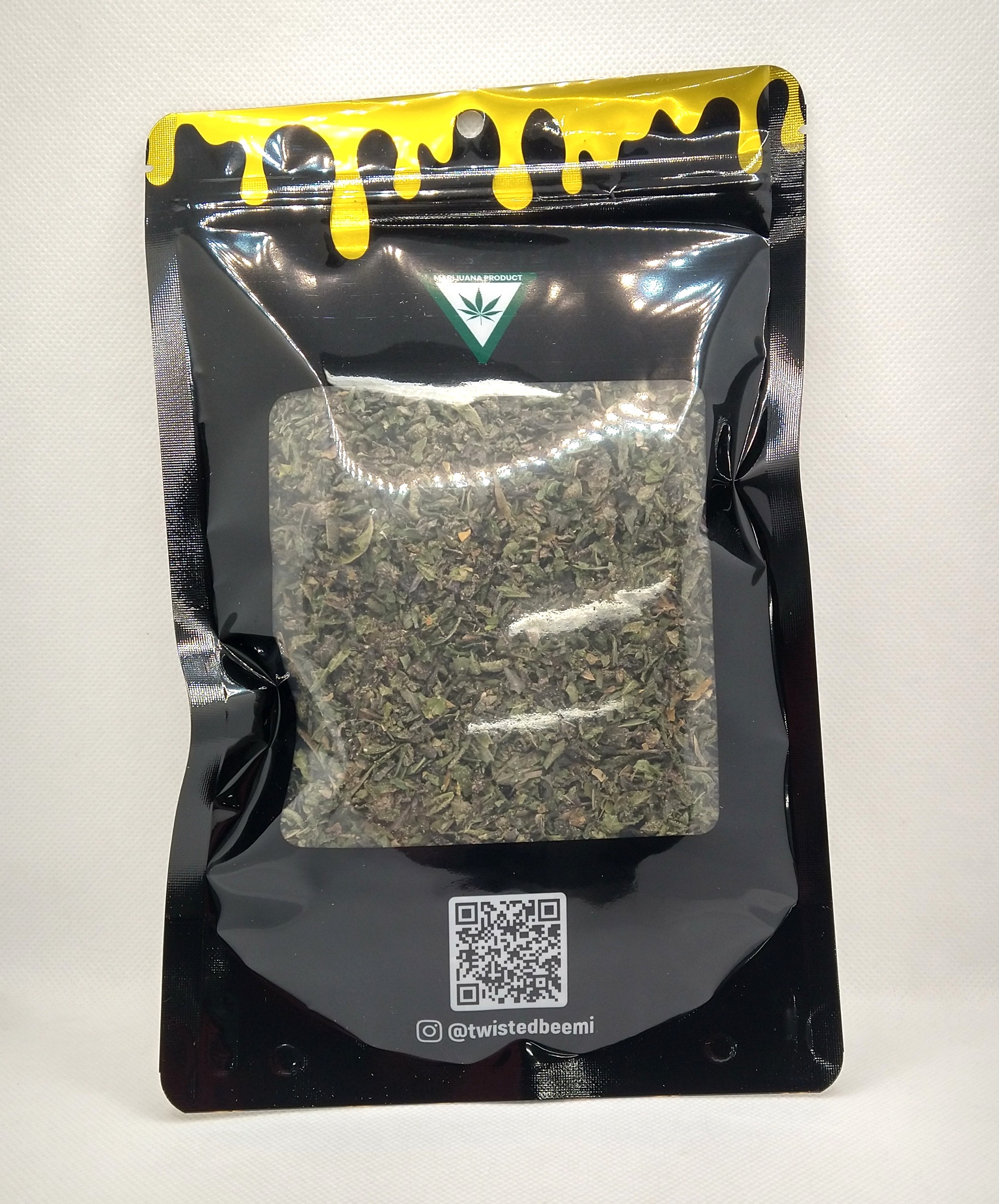 Photograph of product: Giving Tree | Kush Mintz | Shake/Trim Prepacked Oui'd - 28g