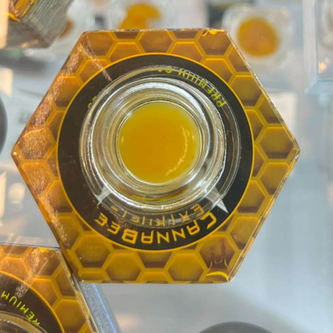Photograph of product: Canna Bee | AJ's Sour Diesel | Live Resin Terp Badder Oui'd