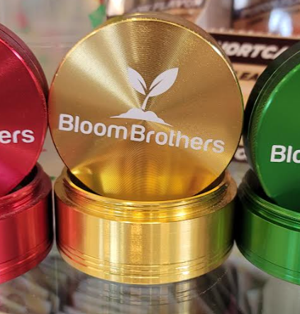 Photograph of product: 2.5" 4 Piece Cali Crusher x Bloom Brothers Grinder - Gold