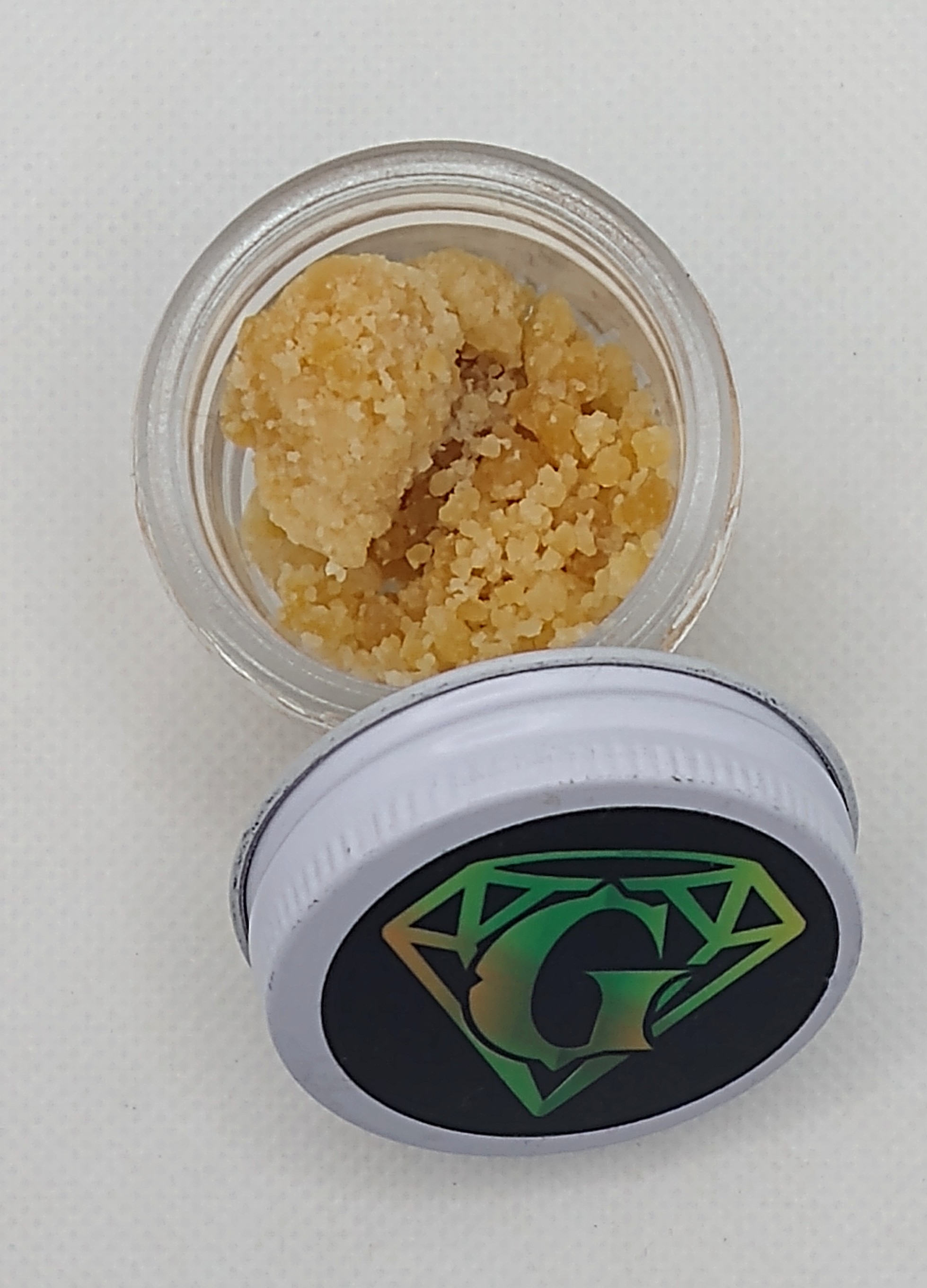 Photograph of product: GreenCo | Sour Strawberry Banana Sherbert | Resin Concentrate Oui'd
