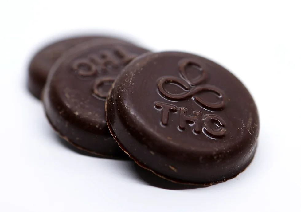 Photograph of product: Discos 100mg Chocolate - Milk Chocolate
