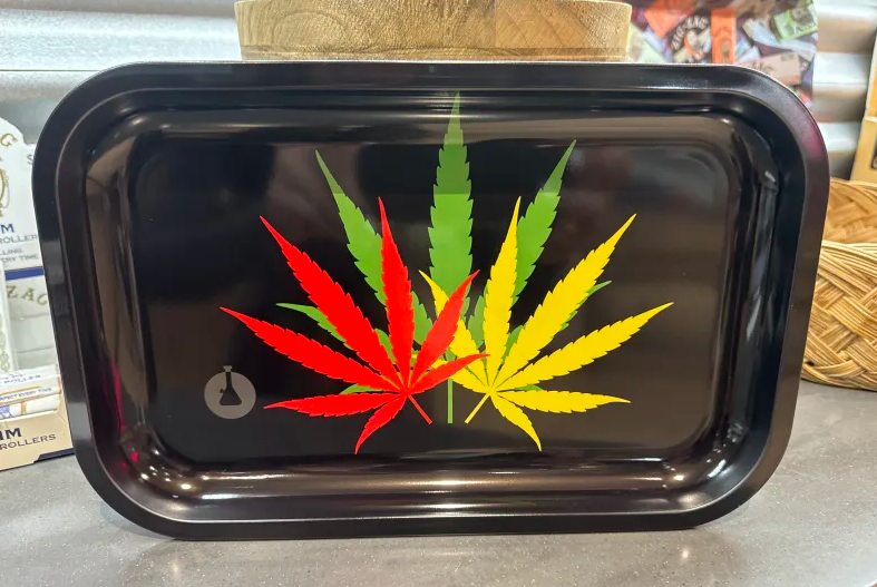 Photograph of product: Lighthouse | Large 10x7 Rolling Tray | Black Rasta Tri-Oui'd Leaf