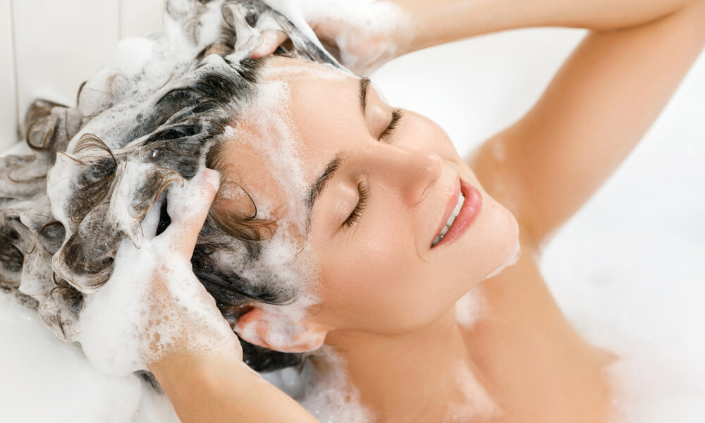 washing-hair-woman-washing-her-hair-and-enjoying-it