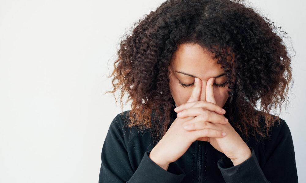 woman-with-head-in-her-hands-sad-depression-thinking