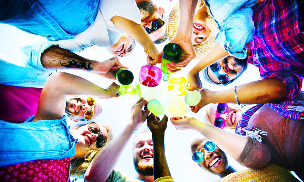 group-of-friends-toasting-with-colorful-drinks