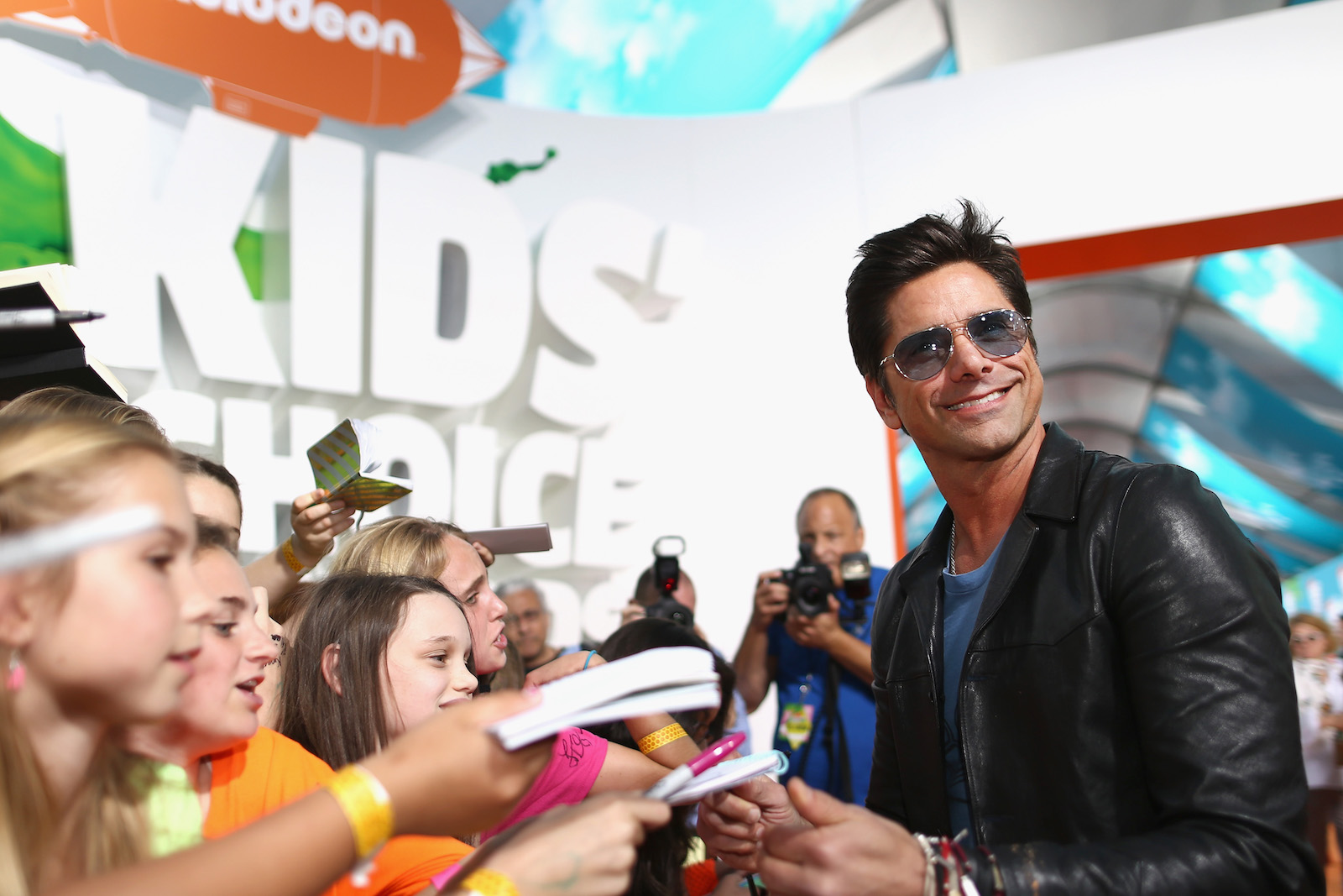 who-john-stamos-is-still-melting-hearts-today-main-image.jpg