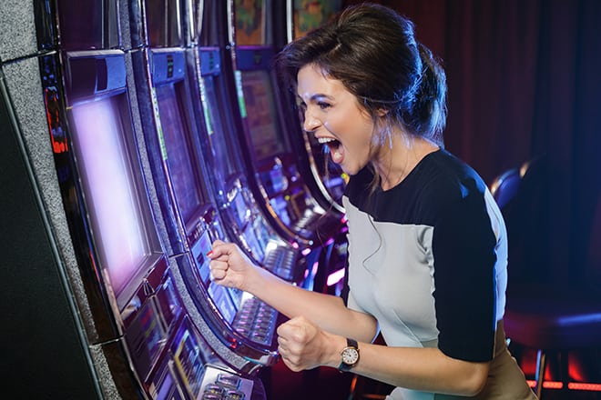 Online-Casino-Games-Most-Loved-by-Women-girl-winning-at-slots