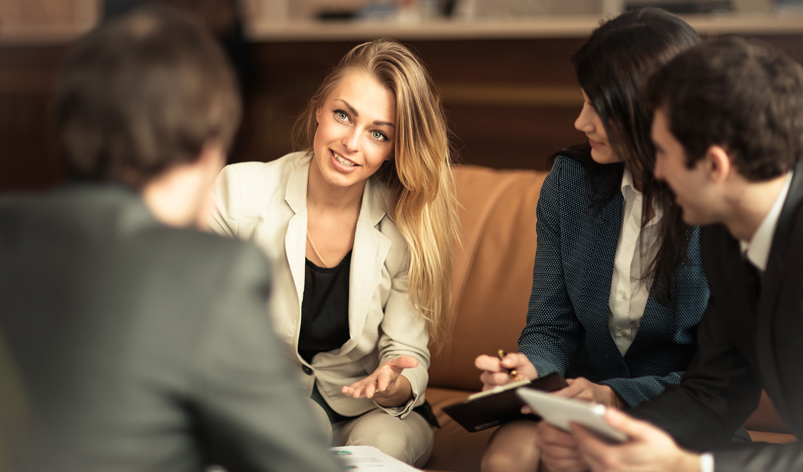 woman-conducting-business-meeting