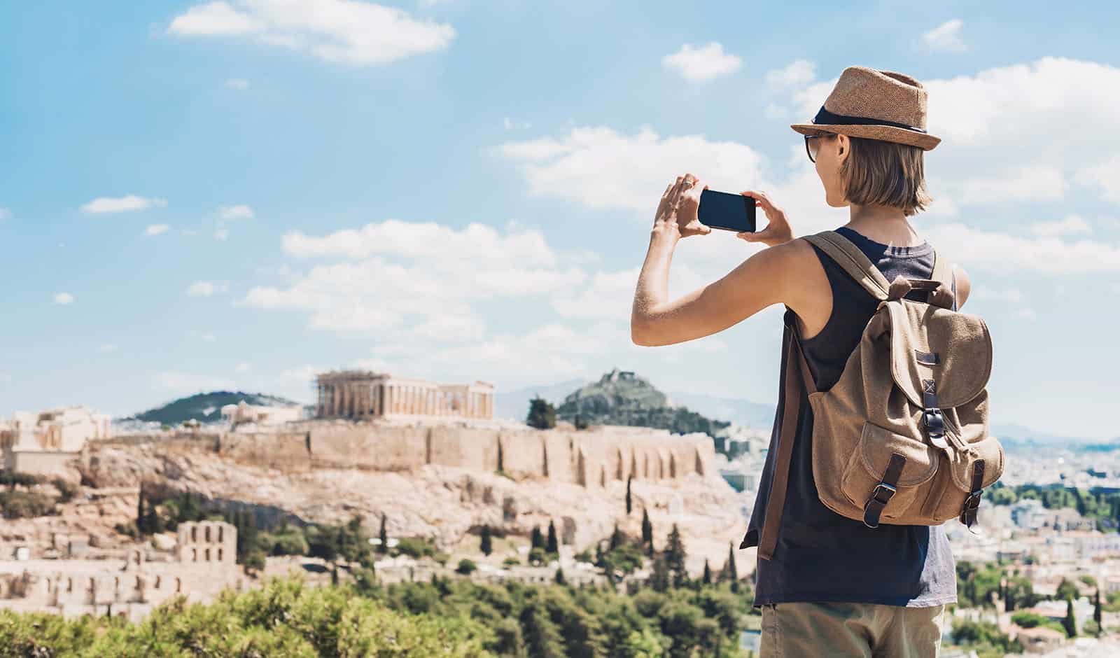 woman taking a photo of nature