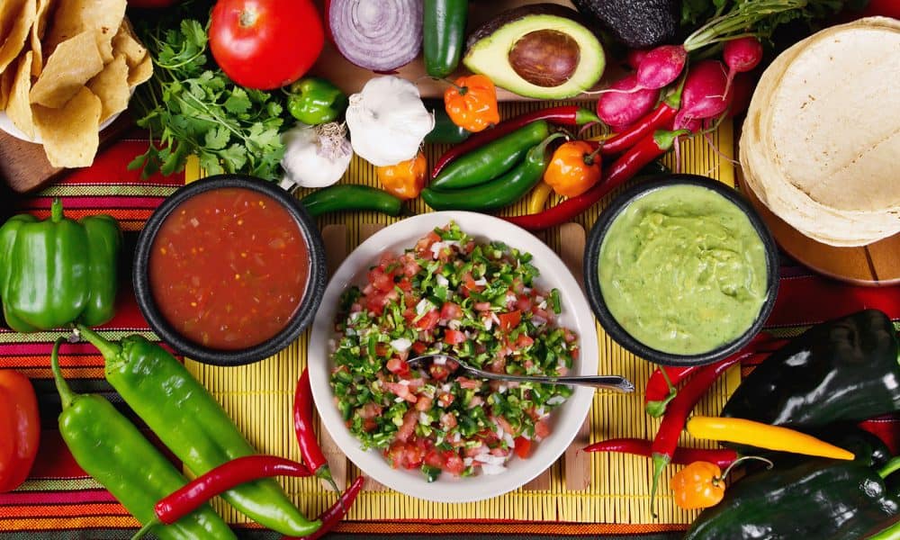 vegan-salsas-and-food-laid-out-on-a-table