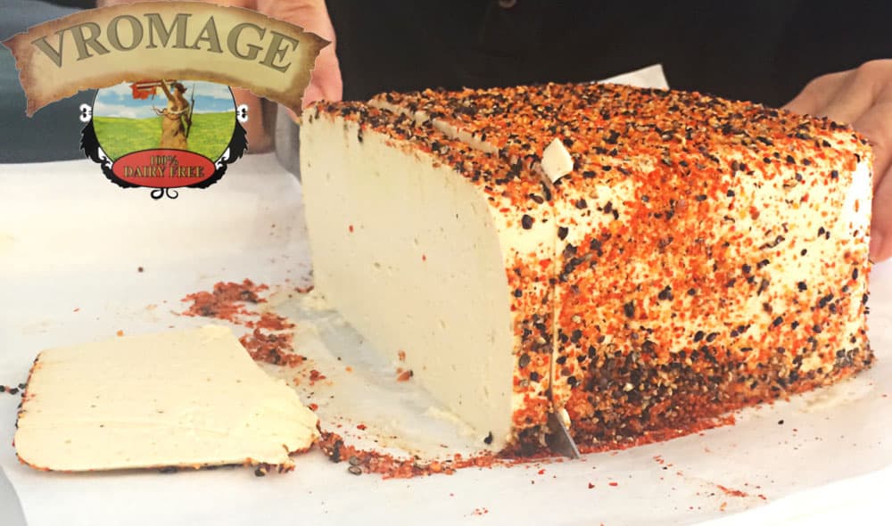 cutting-a-slice-of-vromage-gourmet-vegan-cheese