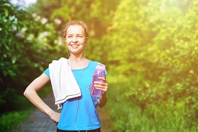 athletes-prepare-for-a-big-game-woman-holding-water-bottle