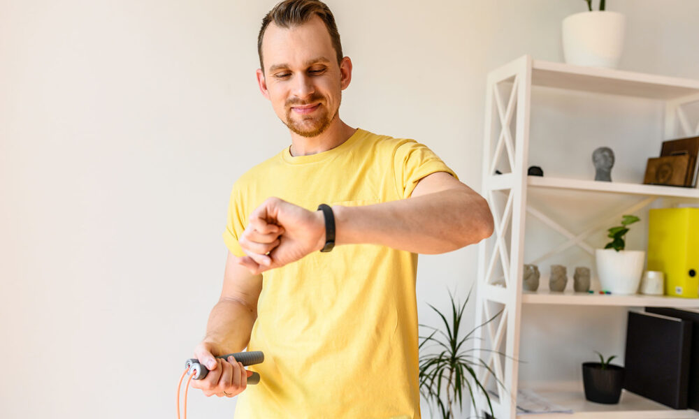 man looking at his watch