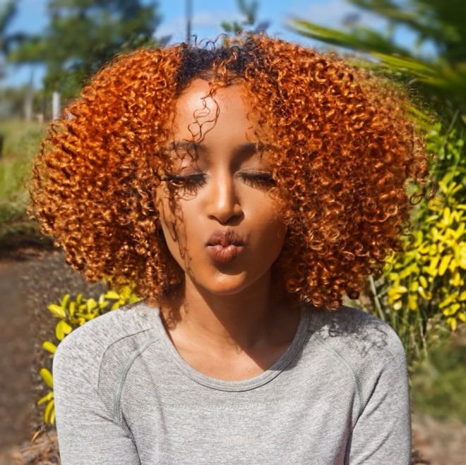 orange hair on dark skin