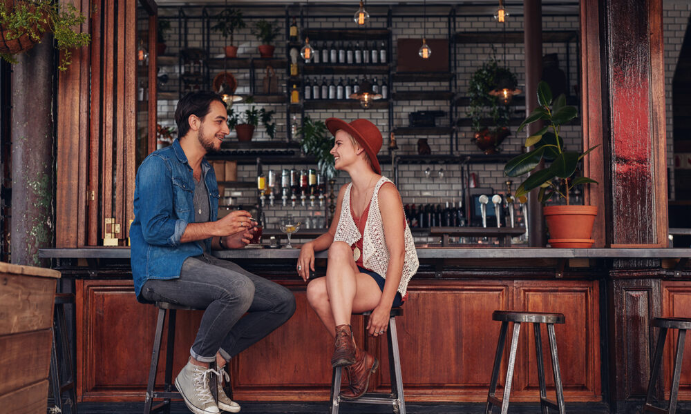 restaurant-bar-stools-patrons-sitting-at-bar