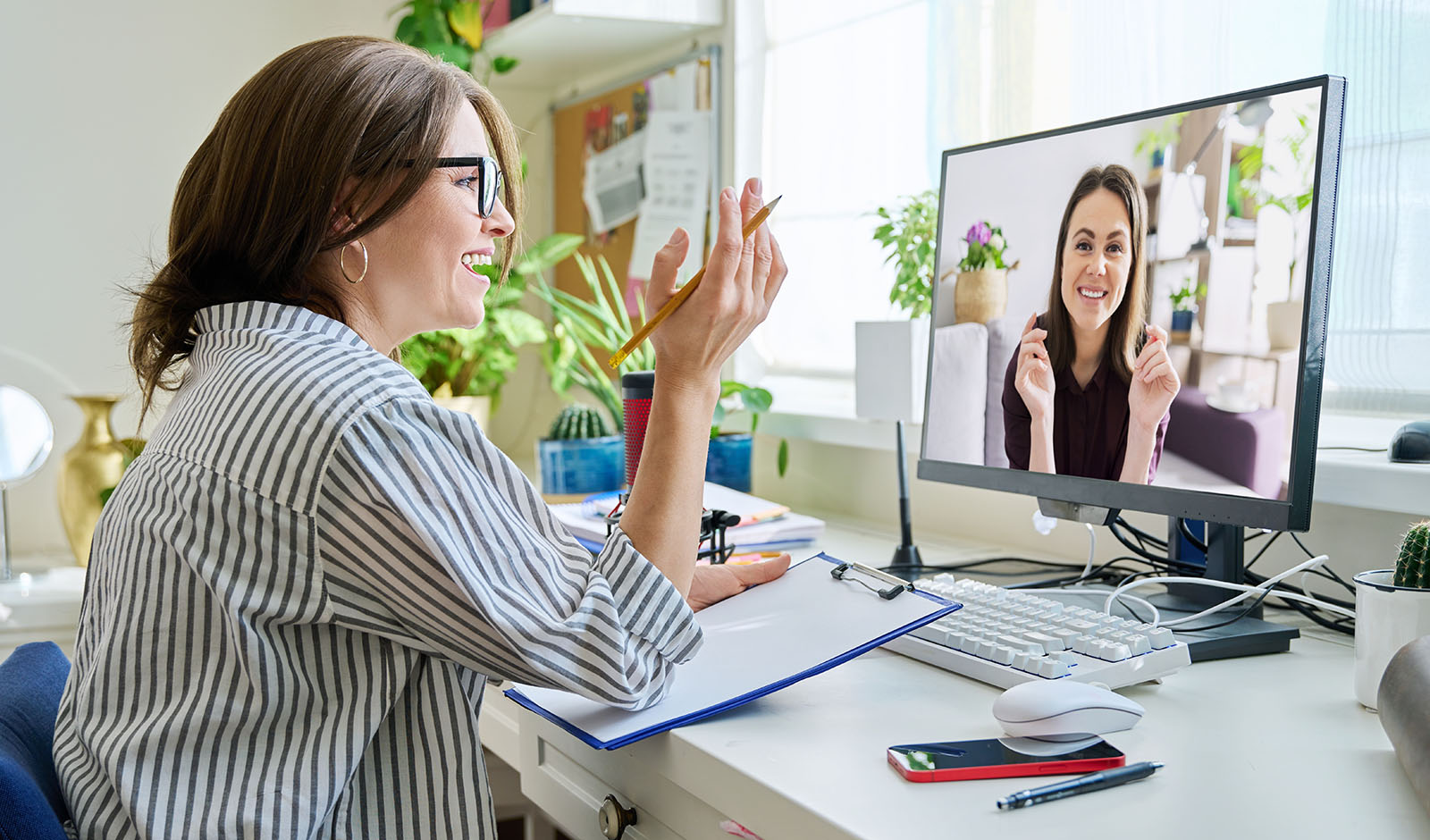 women-talking-online-computer-call-therapy-session