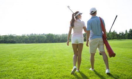 couple-golfing-summer